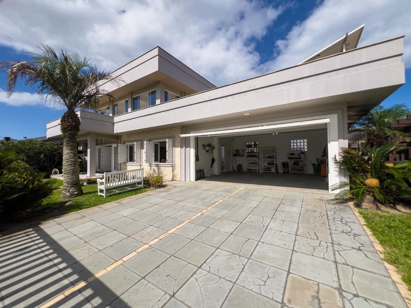 EXCELENTE CASA DE BAIRRO EM XANGRI-LÁ: 3ª foto da galeria de imagens do imóvel