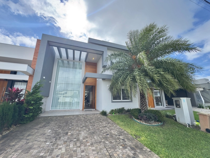 CASA EM COND. FECHADO COMPOSTA POR 05 SUÍTES - INFRA COMPLETA!: 1ª foto da galeria de imagens do imóvel