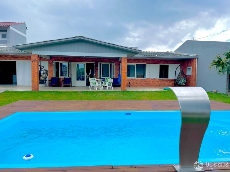 casa 3 dormitórios em Atlantida com piscina!: 1ª foto da galeria de imagens do imóvel