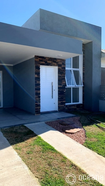 CASA COM TERRACO 3 QUADRAS DO MAR EM CAPAO DA CANOA: 2ª foto da galeria de imagens do imóvel