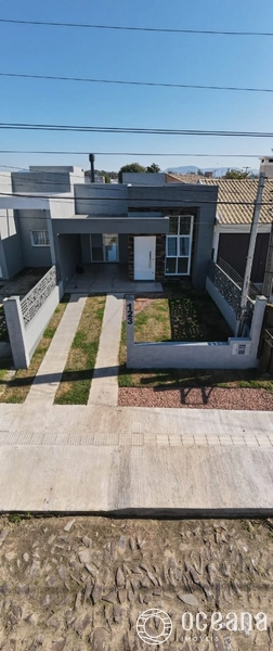 CASA COM TERRACO 3 QUADRAS DO MAR EM CAPAO DA CANOA: 1ª foto da galeria de imagens do imóvel