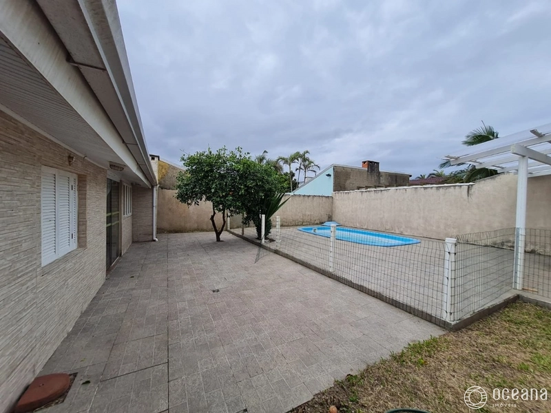 Casa 3 dormitórios Atlântida Sul: 2ª foto da galeria de imagens do imóvel