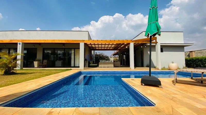 Casa de 3 dorms. e pisc. no Res. Quinta dos Buritis em São Carlos/Sp: 1ª foto da galeria de imagens do imóvel