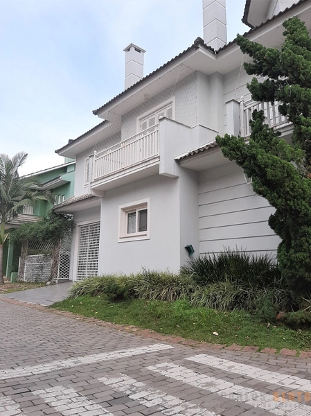 CASA COM 04 DORMITÓRIOS SENDO 02 SUÍTES - POA: 22ª foto da galeria de imagens do imóvel