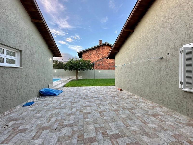 Casa 3 Dormitórios com suíte Com piscina Capão Novo: 5ª foto da galeria de imagens do imóvel