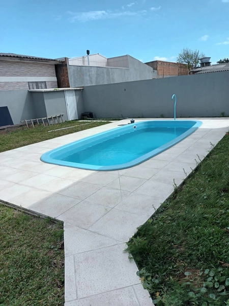 CASA NOVA 03 DORMITORIOS, SUITE, PISCINA ,TERRENO INTEIRO 325 MC2: 1ª foto da galeria de imagens do imóvel