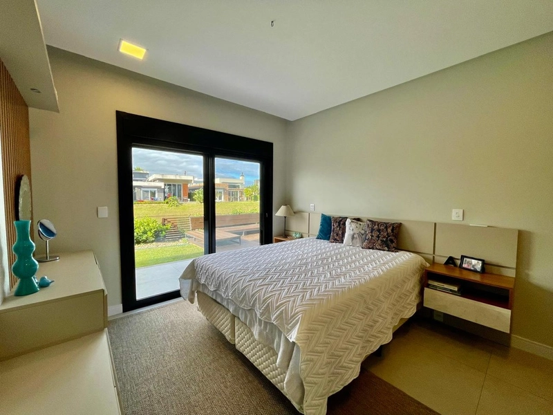 Casa Térrea 4 suítes Beira Lago - Cond Capão Ilhas - Capão da Canoa: 4ª foto da galeria de imagens do imóvel