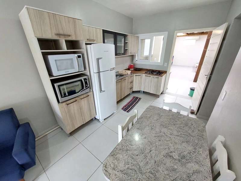 Casa 02 dormitório, espaço gourmet e churrasqueira locação temporada.: 4ª foto da galeria de imagens do imóvel
