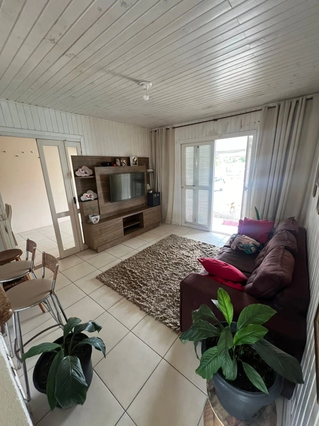 Casa com piscina em Capão da Canoa: 2ª foto da galeria de imagens do imóvel