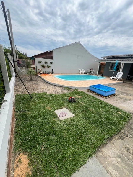 Casa com piscina em Capão da Canoa: 12ª foto da galeria de imagens do imóvel