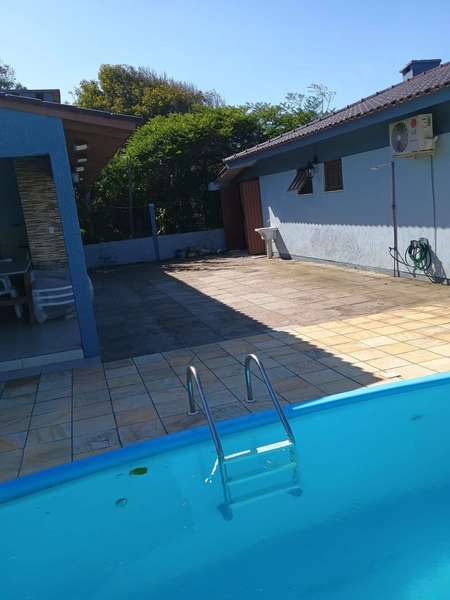 Casa 04 dormitórios sendo 02 suítes com piscina Xangri-la temporada: 29ª foto da galeria de imagens do imóvel