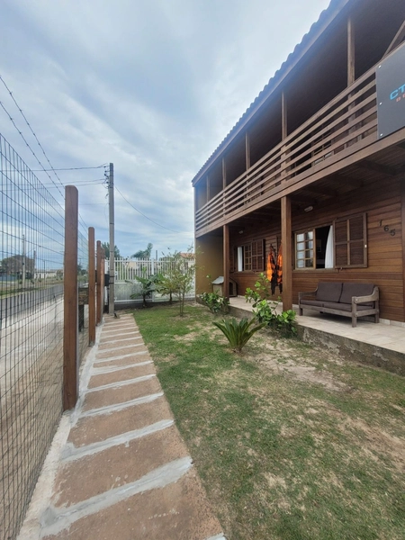 CASA 2 DORMITÓRIOS E 1 SUÍTE/ QUADRA DE BEACH/CAPÃO DA CANOA: 12ª foto da galeria de imagens do imóvel