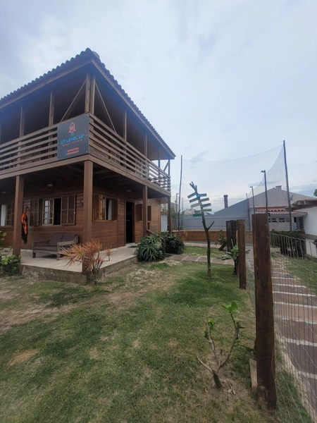 CASA 2 DORMITÓRIOS E 1 SUÍTE/ QUADRA DE BEACH/CAPÃO DA CANOA: 2ª foto da galeria de imagens do imóvel