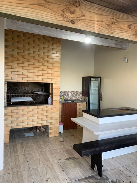 Casa com piscina 02 dormitórios Capão da Canoa Temporada: 4ª foto da galeria de imagens do imóvel