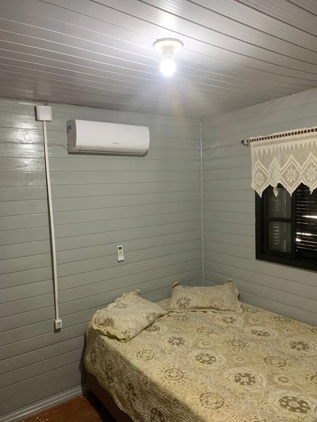 Casa com piscina 02 dormitórios Capão da Canoa Temporada: 5ª foto da galeria de imagens do imóvel