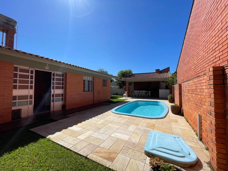 Casa 5 dormitórios no bairro Atlântida Xangrila: 33ª foto da galeria de imagens do imóvel