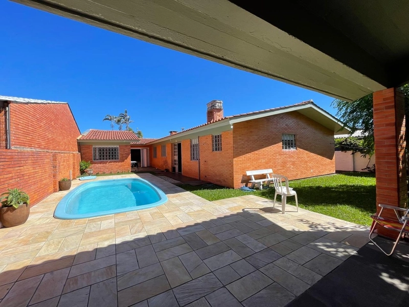 Casa 5 dormitórios no bairro Atlântida Xangrila: 1ª foto da galeria de imagens do imóvel