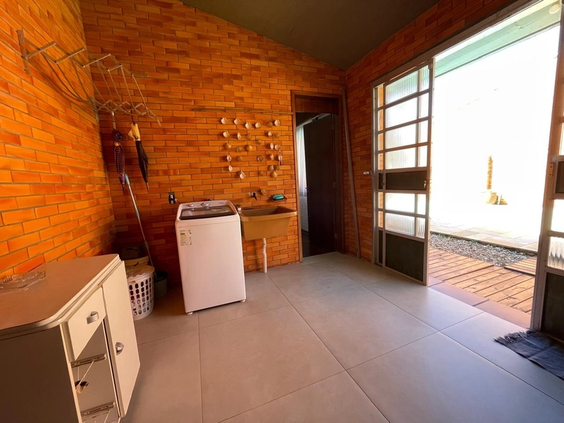 Casa 5 dormitórios no bairro Atlântida Xangrila: 13ª foto da galeria de imagens do imóvel