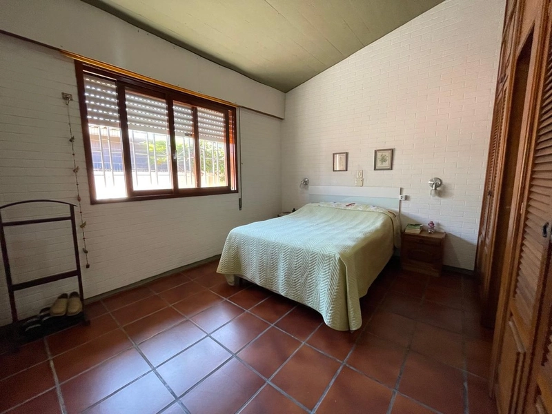 Casa 5 dormitórios no bairro Atlântida Xangrila: 17ª foto da galeria de imagens do imóvel