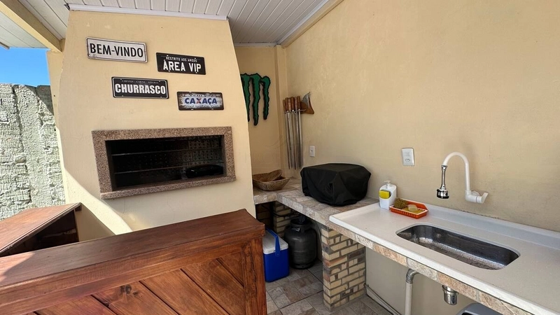 Excelente casa a venda bairro Araça próxima do mar Capão da Canoa: 24ª foto da galeria de imagens do imóvel