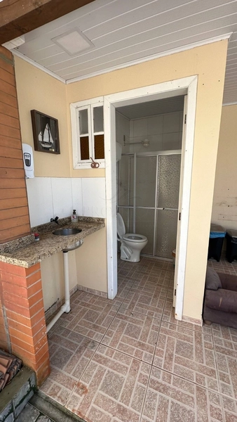 Excelente casa a venda bairro Araça próxima do mar Capão da Canoa: 23ª foto da galeria de imagens do imóvel