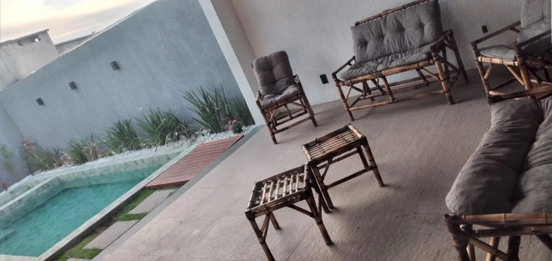 Linda Casa 03 dormitórios com piscina, Capão da Canoa Temporada: 7ª foto da galeria de imagens do imóvel