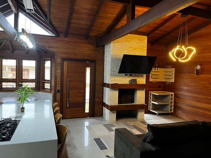 Chalé de praia 03 dormitórios todos sendo suíte com ar condicionado: 2ª foto da galeria de imagens do imóvel