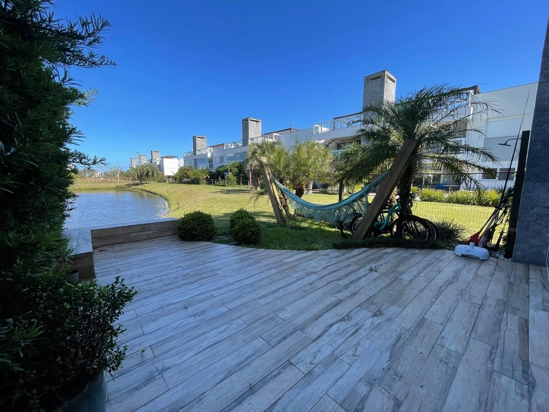 Condomínio Rossi Atlântida. Beira Lago, Atlântida.: 18ª foto da galeria de imagens do imóvel