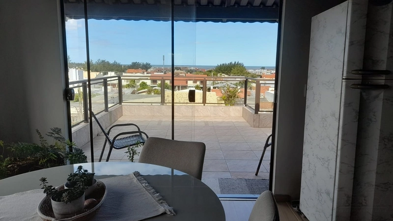 LOft 01 dormitório com terraço ideal para suas férias de verão: 1ª foto da galeria de imagens do imóvel