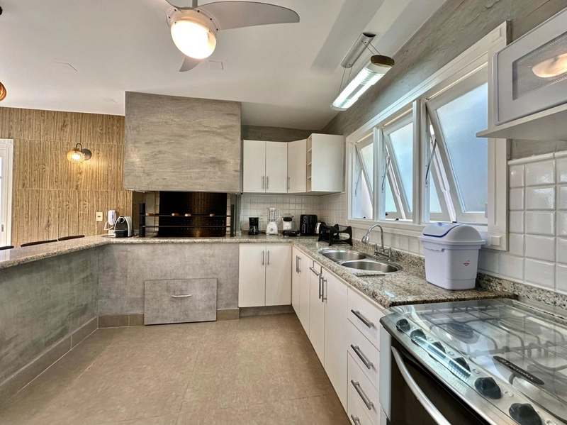 SOBRADO COM PISCINA NO CENTRO DE ATLÂNTIDA: 3ª foto da galeria de imagens do imóvel