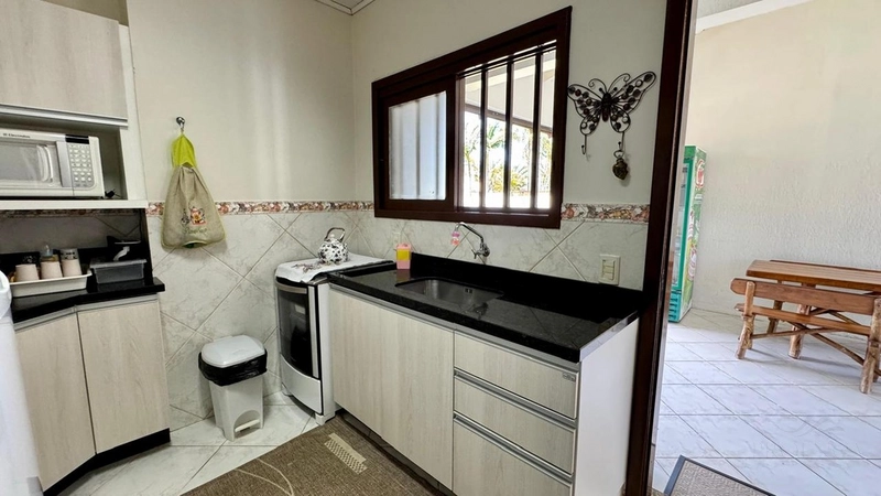 Excelente casa 03 dormitórios com  piscina em Atântida para Temporada: 6ª foto da galeria de imagens do imóvel