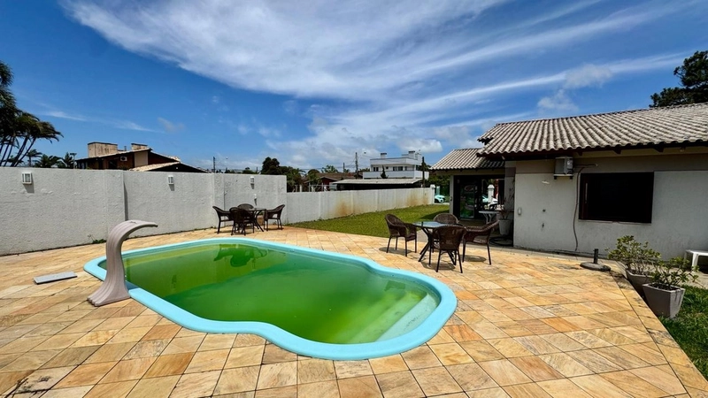 Excelente casa 03 dormitórios com  piscina em Atântida para Temporada: 12ª foto da galeria de imagens do imóvel