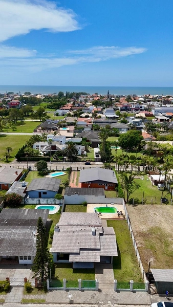 Excelente casa 03 dormitórios com  piscina em Atântida para Temporada: 26ª foto da galeria de imagens do imóvel