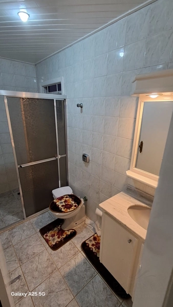 Sobrado com 03 dormitórios sendo 01 suíte, com garagem para 03 carros: 13ª foto da galeria de imagens do imóvel