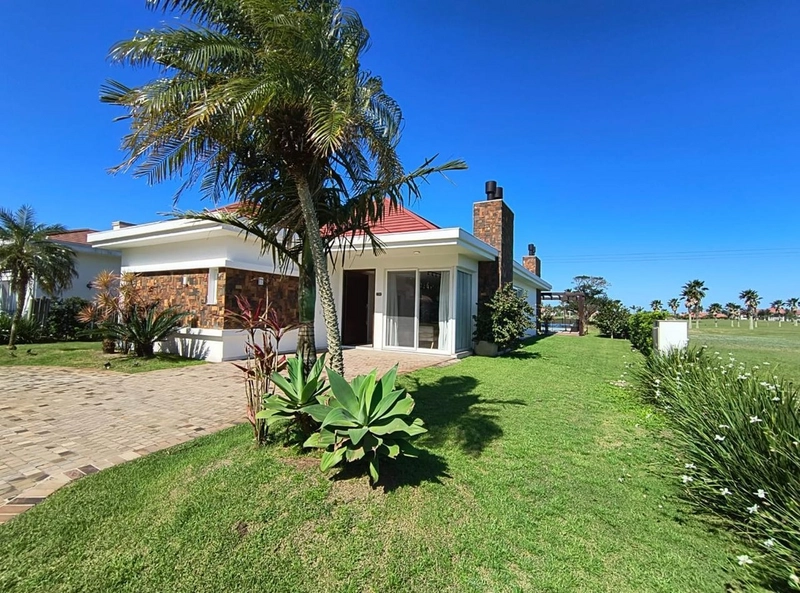 Casas à venda em Xangri-Lá, Condomínio Green Village: 1ª foto da galeria de imagens do imóvel