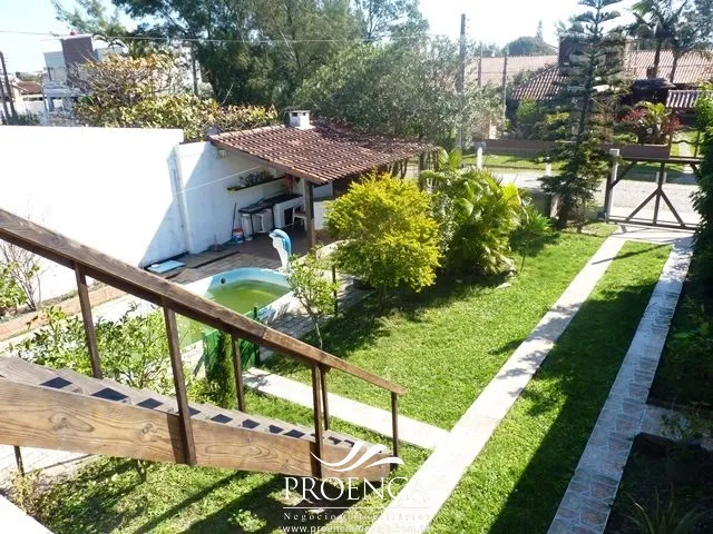Casa a venda 03 dormitórios com piscina em Capão da Canoa: 2ª foto da galeria de imagens do imóvel