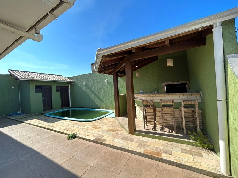 Casa 4 dormitórios com piscina no Centro de Xangri-lá: 9ª foto da galeria de imagens do imóvel