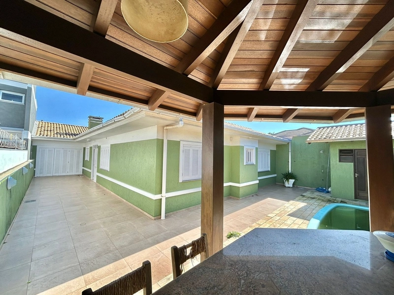 Casa 4 dormitórios com piscina no Centro de Xangri-lá: 21ª foto da galeria de imagens do imóvel