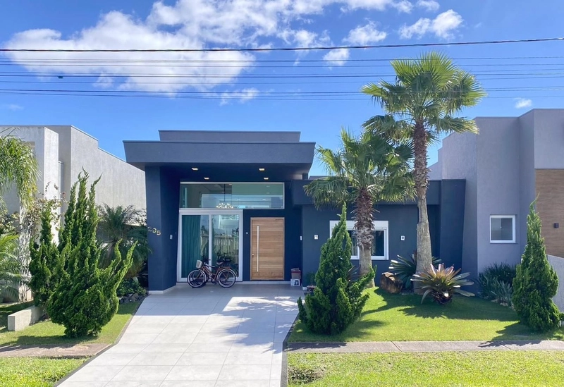 Casa Térrea 4 suítes Beira Lago - Cond capão Ilhas - Capão da Canoa: 2ª foto da galeria de imagens do imóvel