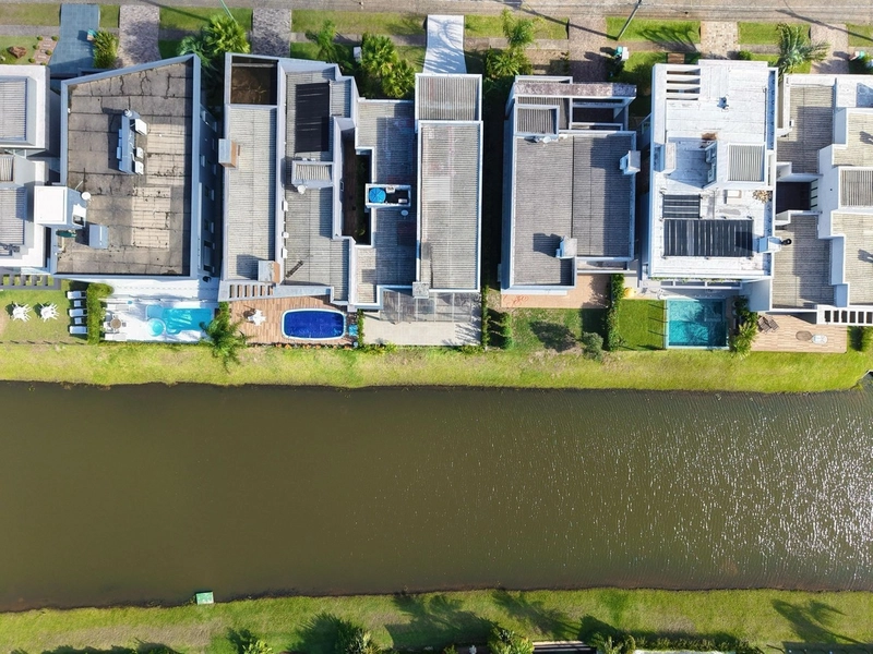Casa Térrea 4 suítes Beira Lago - Cond capão Ilhas - Capão da Canoa: 24ª foto da galeria de imagens do imóvel