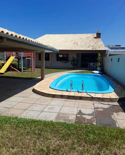 Casa 4 dormitórios com piscina no Centro de Xangri-lá: 7ª foto da galeria de imagens do imóvel