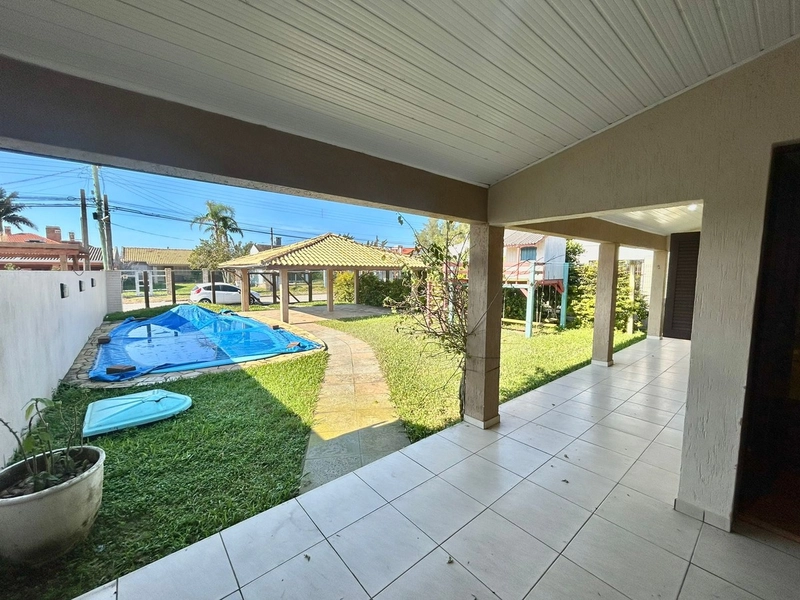 Casa 4 dormitórios com piscina no Centro de Xangri-lá: 10ª foto da galeria de imagens do imóvel