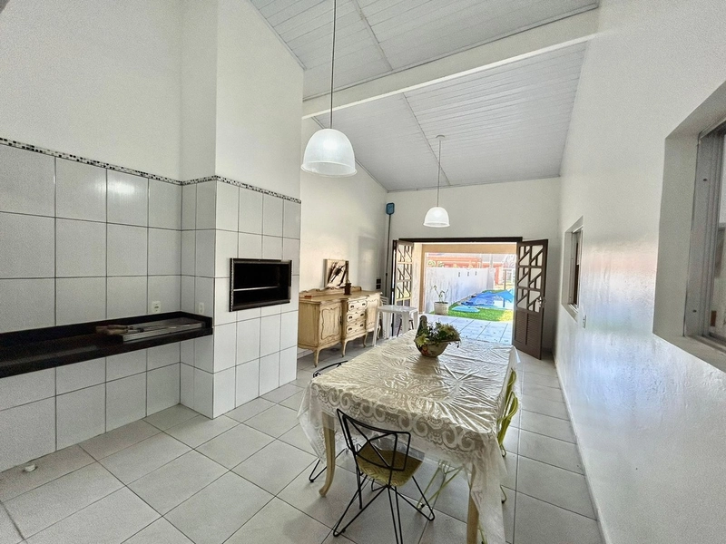 Casa 4 dormitórios com piscina no Centro de Xangri-lá: 9ª foto da galeria de imagens do imóvel