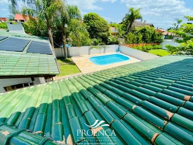 Sobrado 4 dormitórios com piscina em Atlântida: 5ª foto da galeria de imagens do imóvel