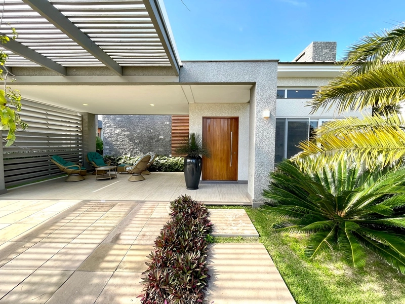 Excelente casa Terreá composta de 3 suítes,Lindo Paisagismo.: 2ª foto da galeria de imagens do imóvel