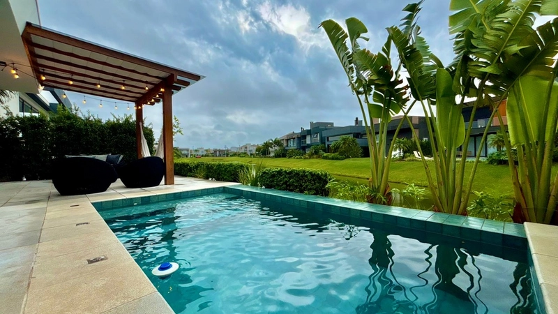 Casa térrea 4 suítes Condomínio Capão ilhas Resort
