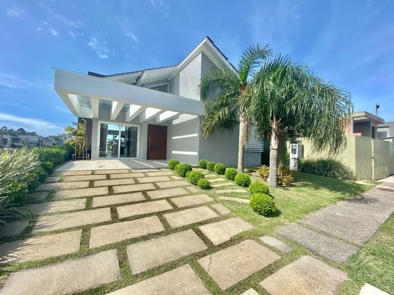 Casa Térrea 4 suítes Beira Lago- Cond Capão Ilhas - Capão da Canoa: 1ª foto da galeria de imagens do imóvel