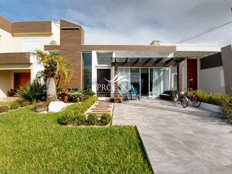 Casa térrea 4 suítes, Condomínio Las Palmas em Xangri-lá: 2ª foto da galeria de imagens do imóvel