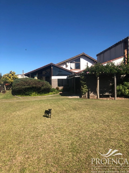 Casa térrea com 3 suítes, no bairro Zona nova em Capão da Canoa: 1ª foto da galeria de imagens do imóvel