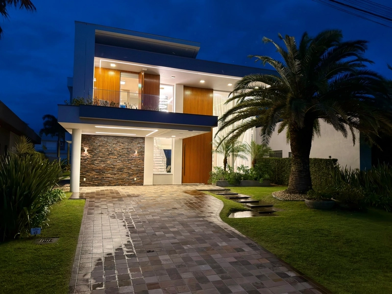 Casa 5 suítes condomínio Enseada em Xangri-lá: 2ª foto da galeria de imagens do imóvel